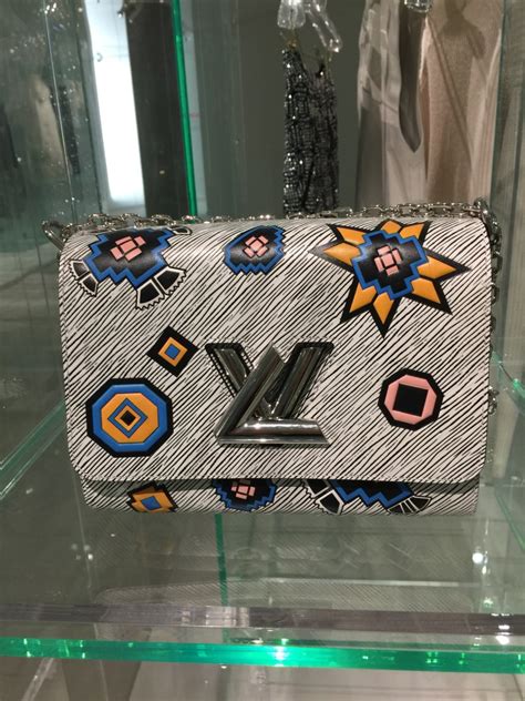 saks employee discount on louis vuitton